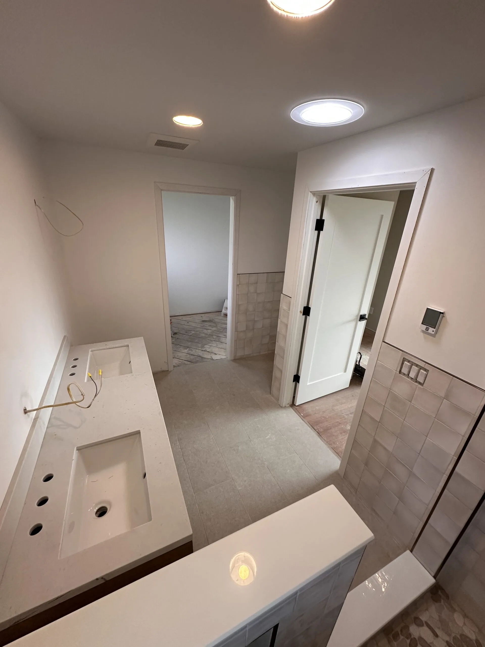 Kitchen transformation — custom island, quartz counters, LVP flooring